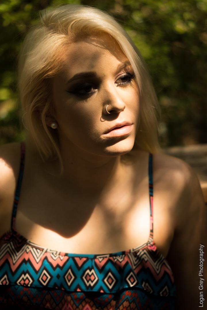 Female model photo shoot of jordandanielle by Logan Grey