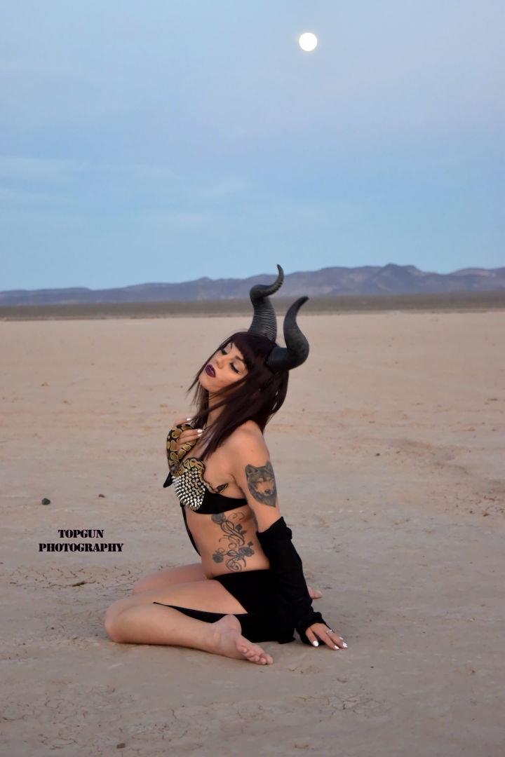 Female model photo shoot of Cali Marie Lee by TopGun Photography in boulder city dry lake bed