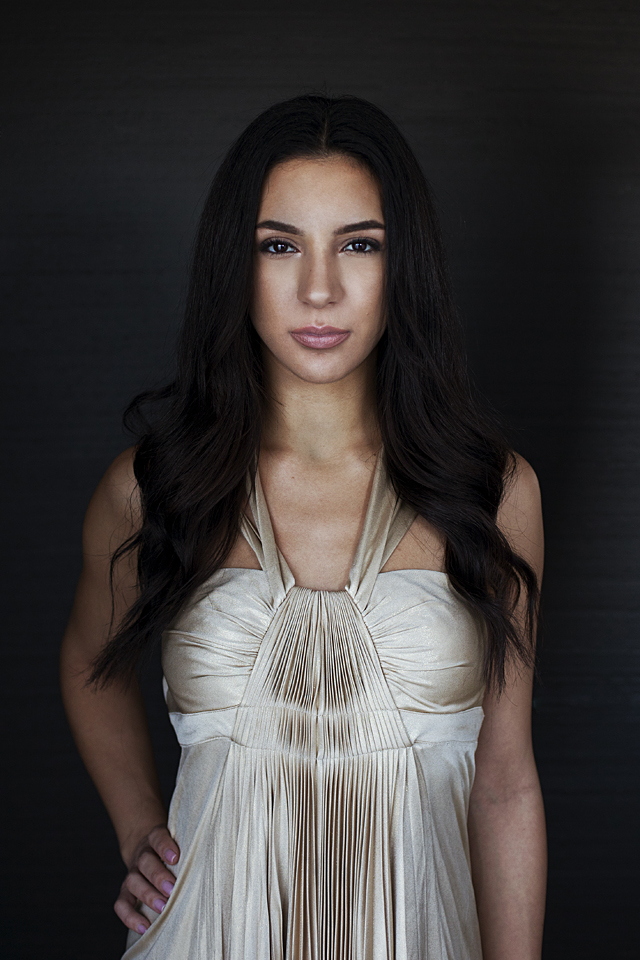 Female model photo shoot of Deanna Mae  in Calgary, makeup by makeupbykatina