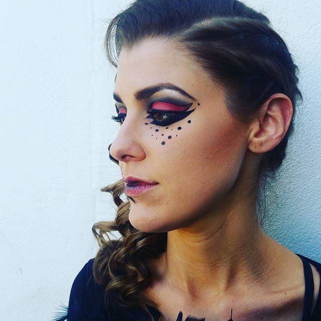 Female model photo shoot of Urban Nightshade Makeup