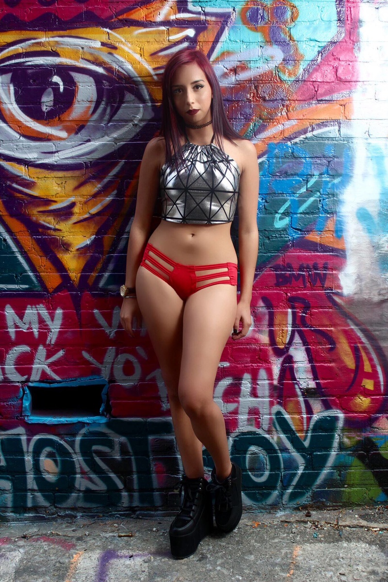 Female model photo shoot of Jacqueline_Nicole93 in Graffiti Warehouse