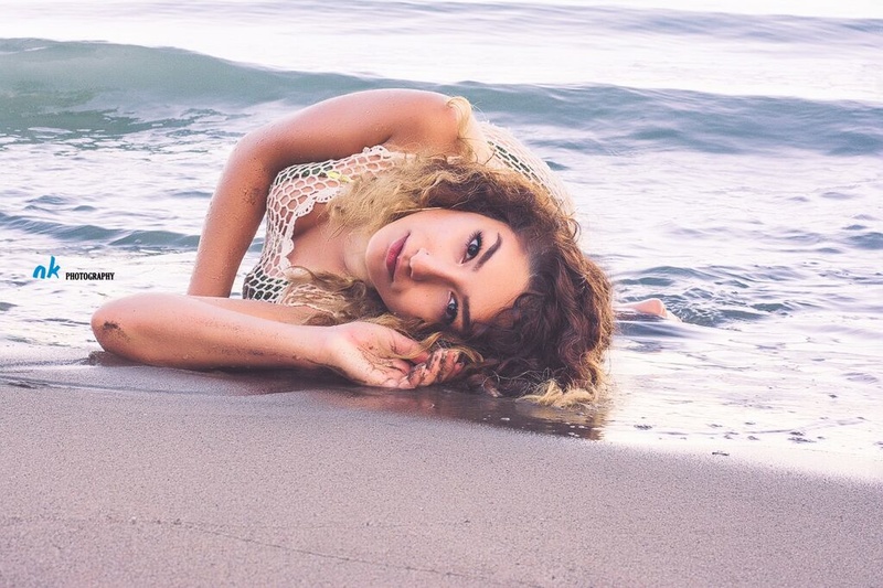 Female model photo shoot of Hadeel in Bluffs Beach