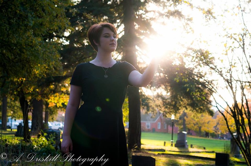 Female model photo shoot of Emmie by A Driskill Photography in Pioneer Cemetery