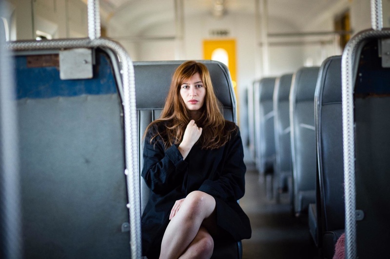 Female model photo shoot of Constance Pizon in Capetown train