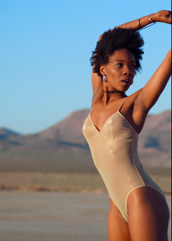 Female model photo shoot of OniOrla in El Mirage dry lakebed