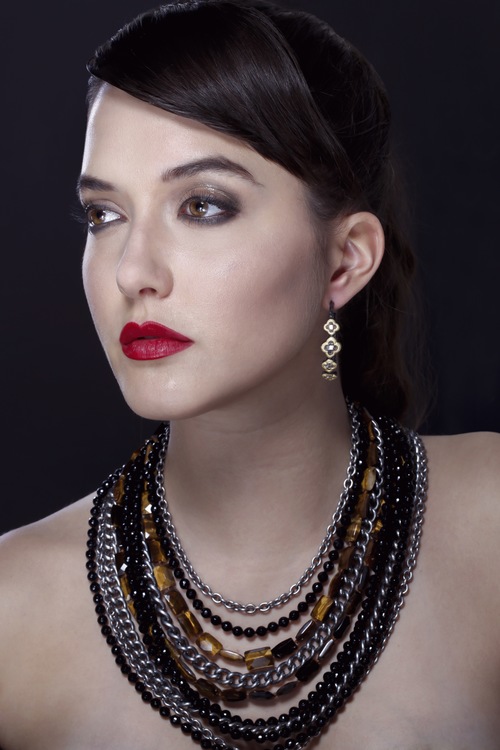 Female model photo shoot of Rakhil S Makeup