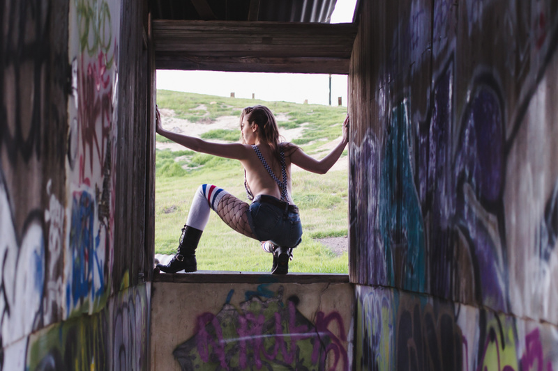 Female model photo shoot of Rhiannon Bow in slaughter house
