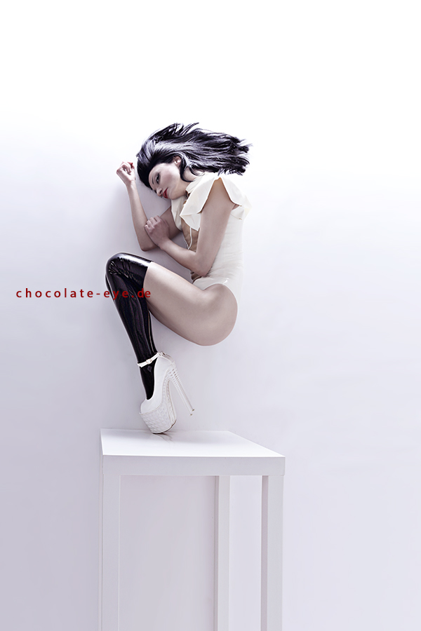 Female model photo shoot of Chocolate-Eye  in Studio