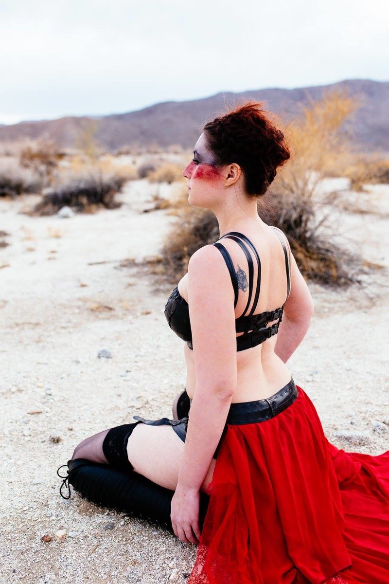Female model photo shoot of Brigetta  by Alina M Photography in Anza-Borrego Desert State Park, clothing designed by Rubberlesque