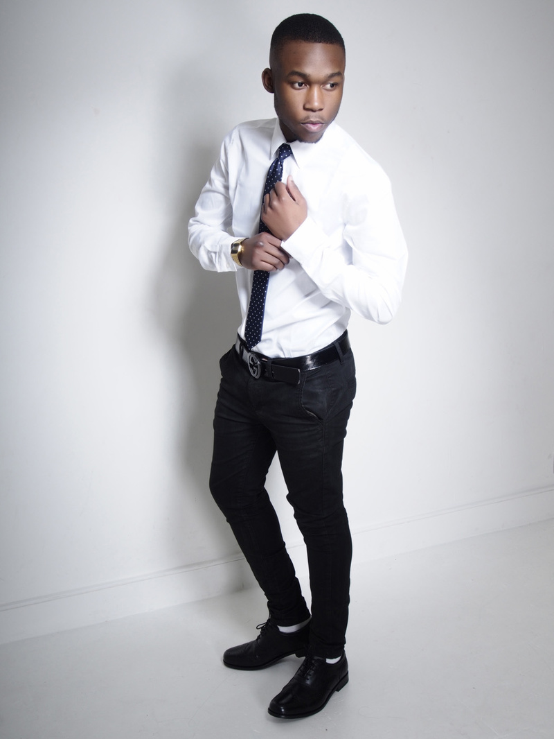 Male model photo shoot of Sim Mbatha