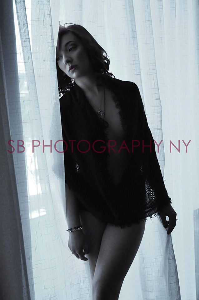 Female model photo shoot of JindrArt in Adams Mark Hotel. Buffalo, New York., clothing designed by Bales