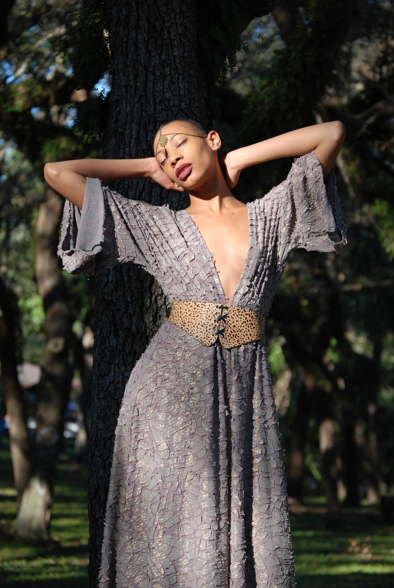 Female model photo shoot of Rayne Burse, clothing designed by Reve Couture