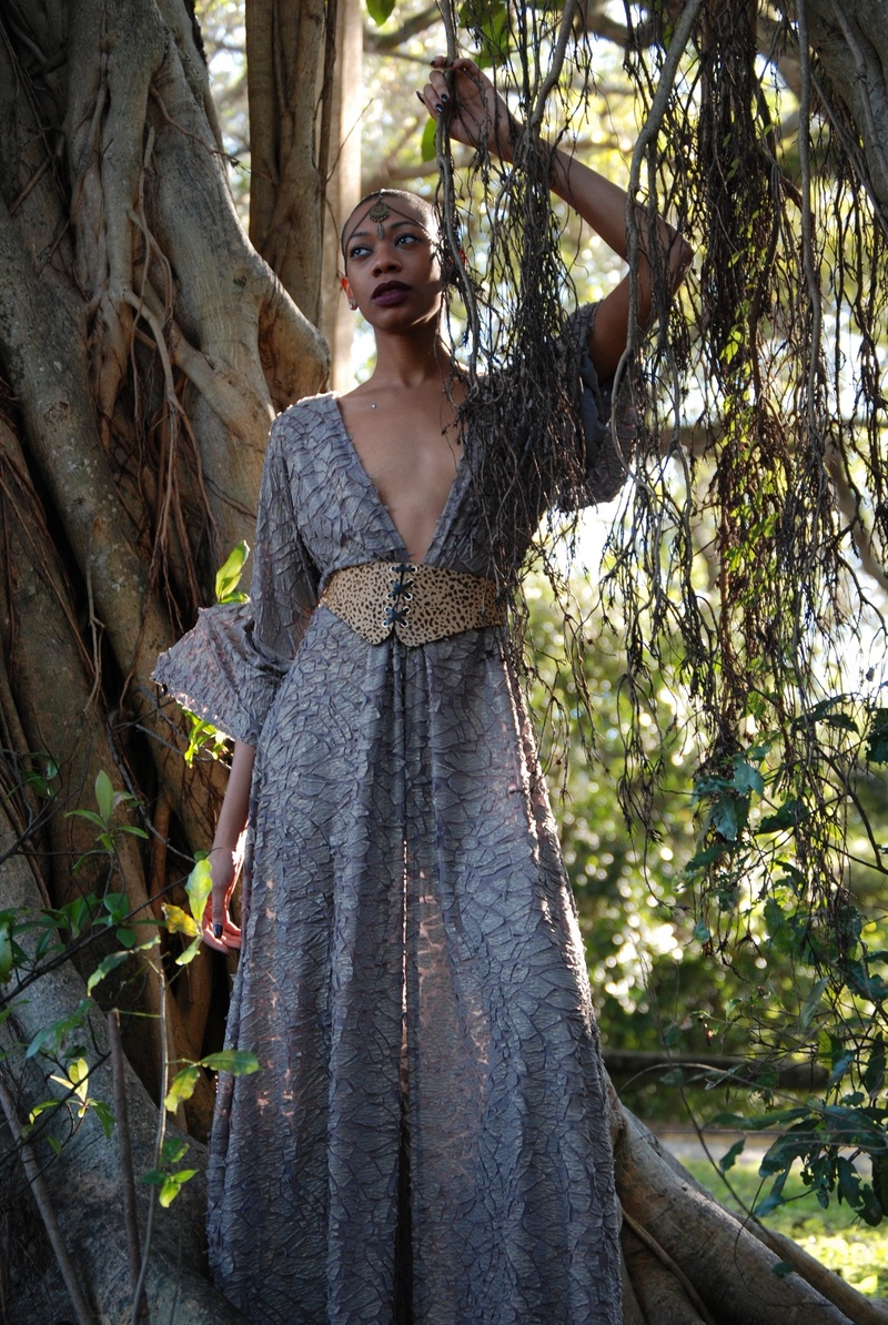Female model photo shoot of Rayne Burse, clothing designed by Reve Couture