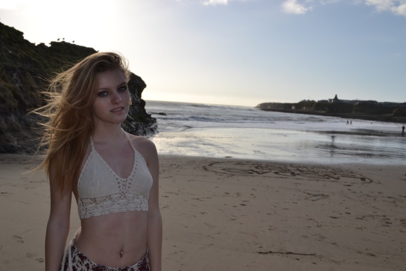 Female model photo shoot of Jensen Skinner  in Natural bridges beach