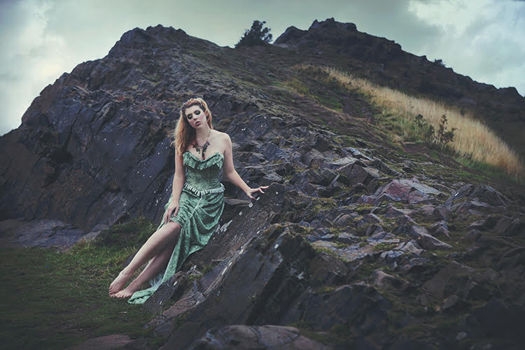 Female model photo shoot of Elli Fox by WinterWolf Studios and Temperate Sage in Arthur's Seat, makeup by Ruby Randall