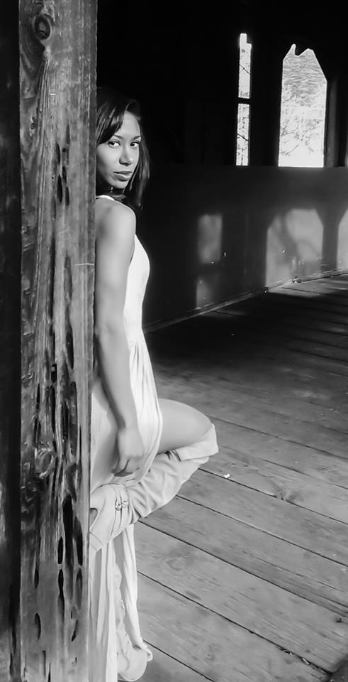 Female model photo shoot of SadeBryant in Bridge