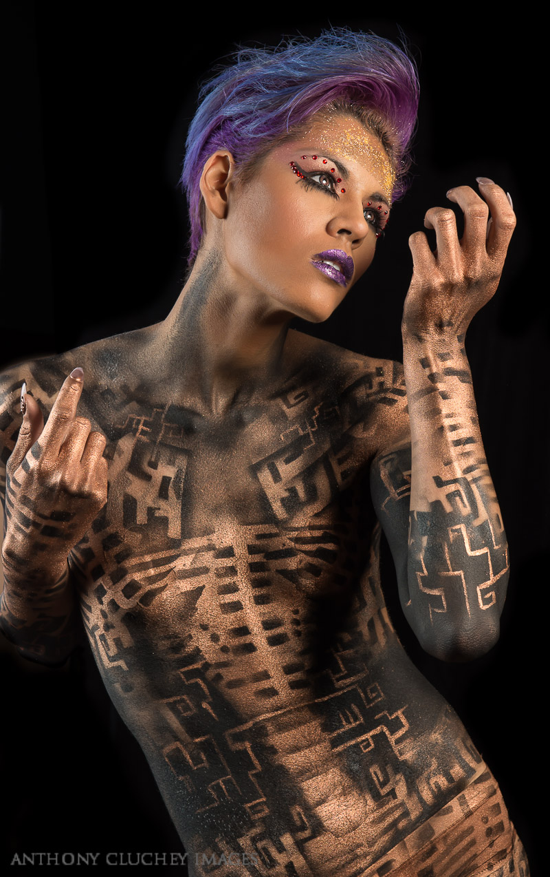 Female model photo shoot of Mida Alpha-Romero in EyeMage Studios