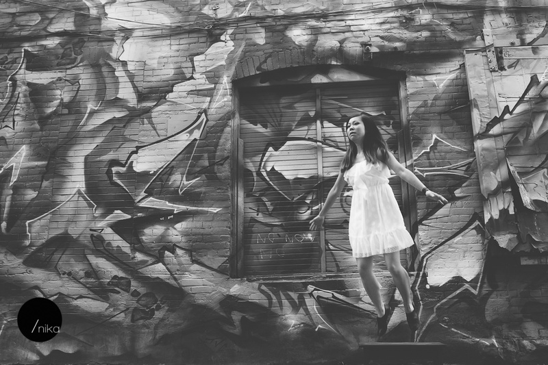 Female model photo shoot of Nika Z in Graffiti Alley, Toronto