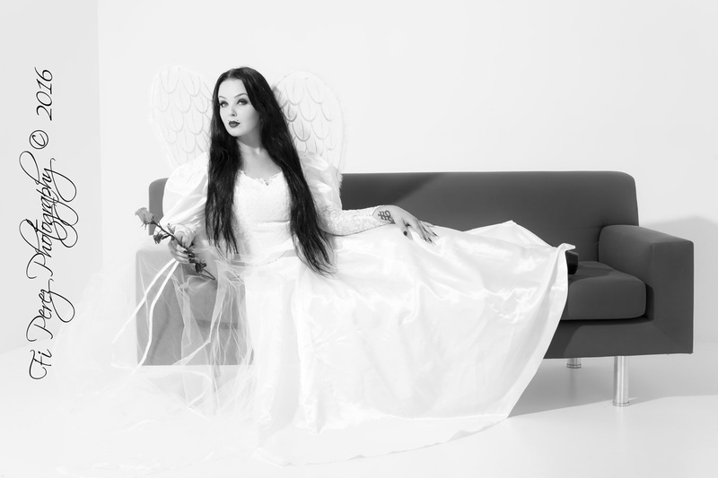 Female model photo shoot of Fallen-Angel