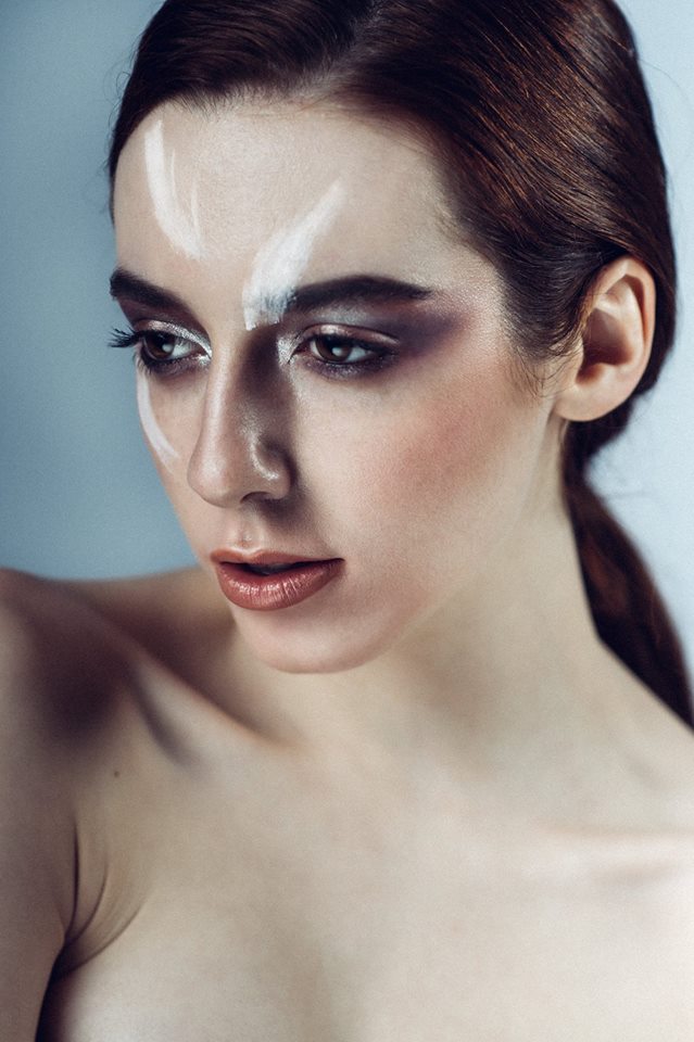 Female model photo shoot of Crawl Make Up