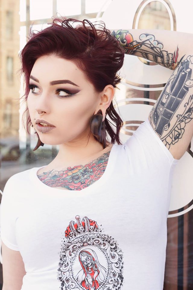 Female model photo shoot of Dollie Diem in Chicago, Illinois   Rockstar Barbershop and Ink