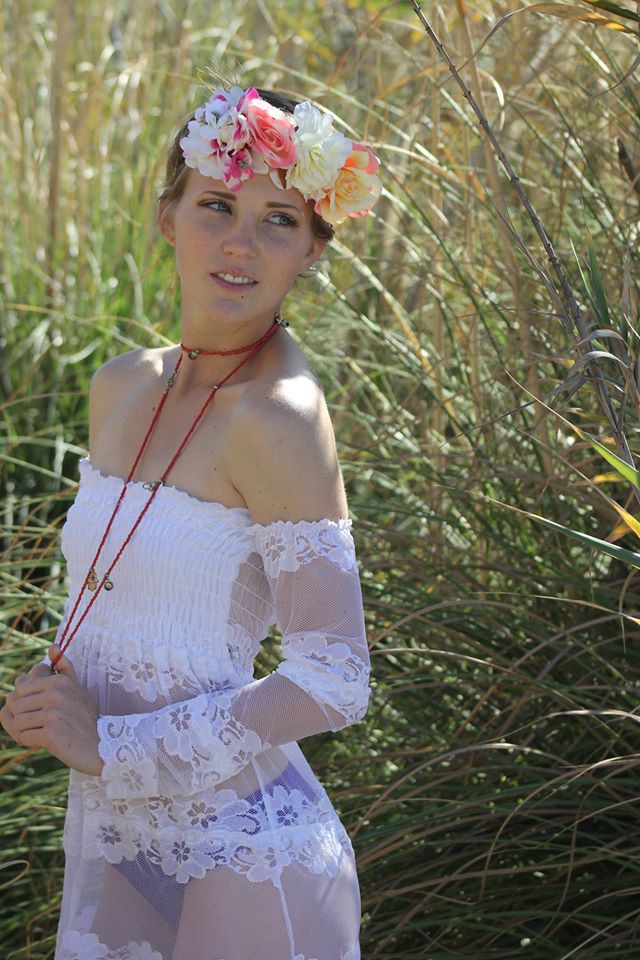Female model photo shoot of flowersandweed