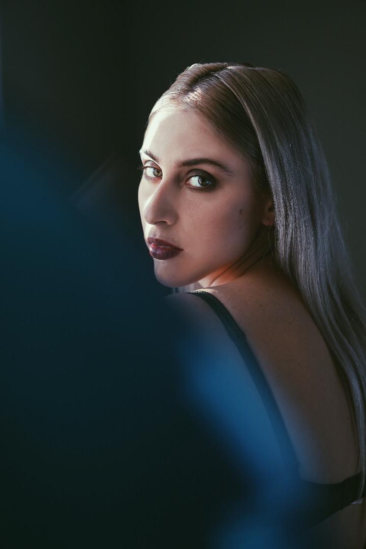 Female model photo shoot of Soft Lights
