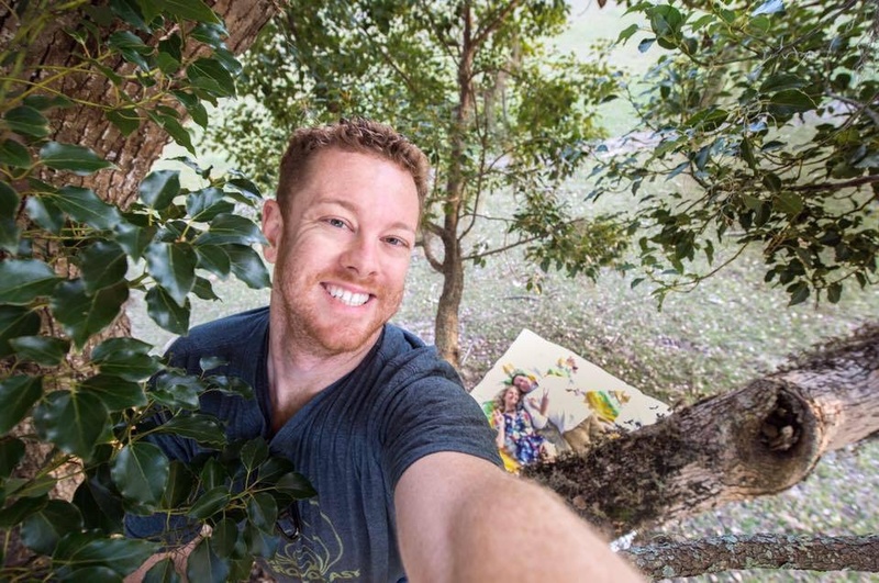 Male model photo shoot of Mark Dickinson in Orlando field In a Tree