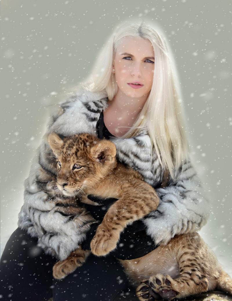 Female model photo shoot of DesireeAdams in Jungle Cat World