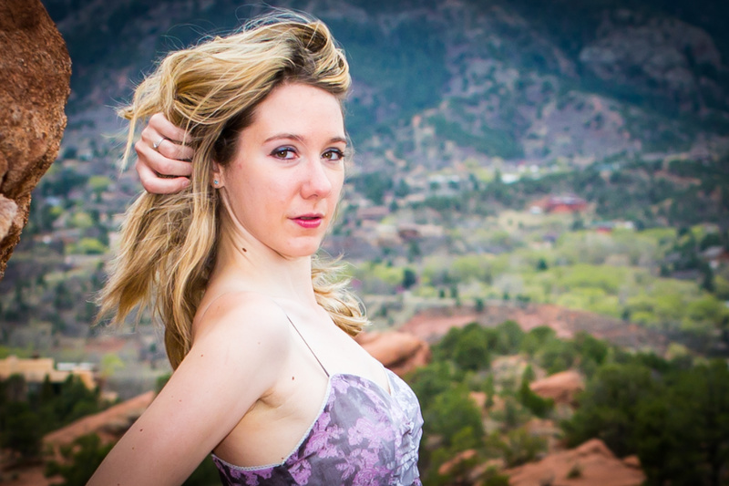 Female model photo shoot of Kdelaurell30 by Motion Photography in garden of the gods