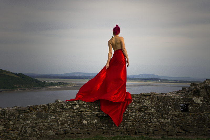 Female model photo shoot of Incandescent Joy by Angelillustrations in Llansteffan Castle