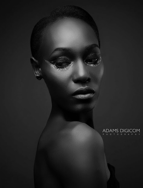 Female model photo shoot of African blackfox Model in Dar es salaam