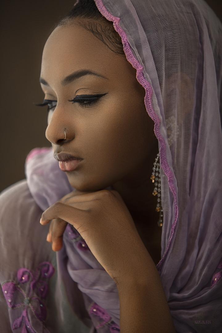 Female model photo shoot of DjenabaBalde by Gem - n - Eye