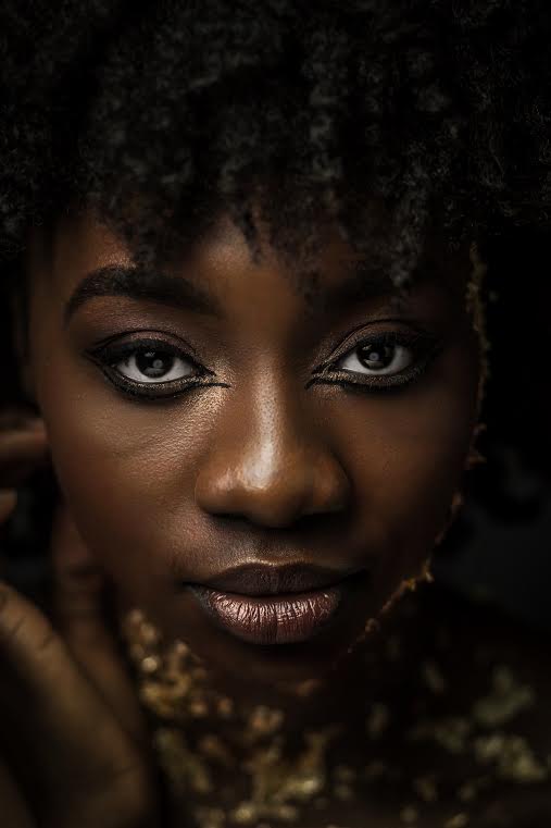 Female model photo shoot of Afia Anima Asante