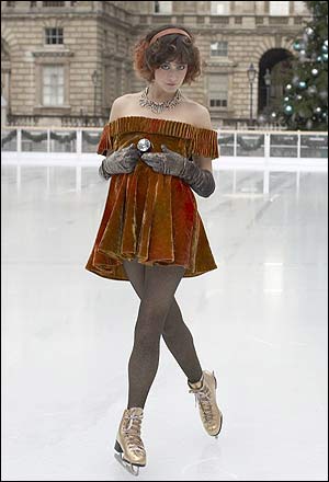 Female model photo shoot of kinyobi in Somerset House ice rink, London UK