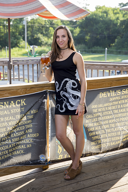 Female model photo shoot of Sara Edwards in Modeling for Brewer Shirts @ Apocalypse Ale Works in Forest, Virginia