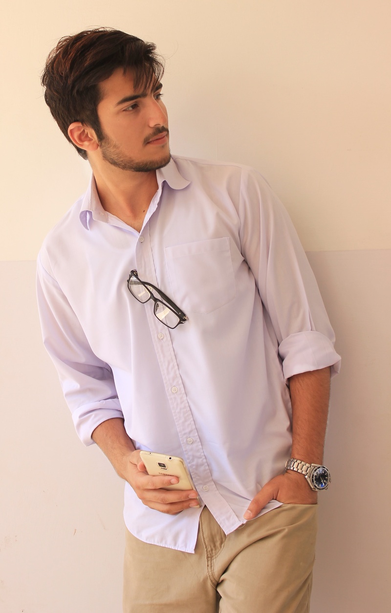 Male model photo shoot of Hamza Yousaf