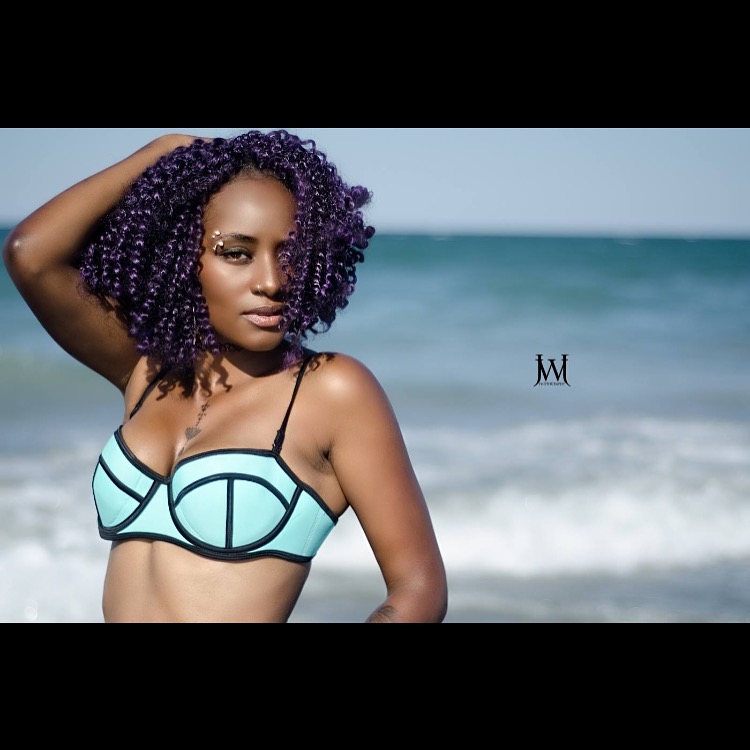 Female model photo shoot of Nysha Robinson in nantasket beach hull