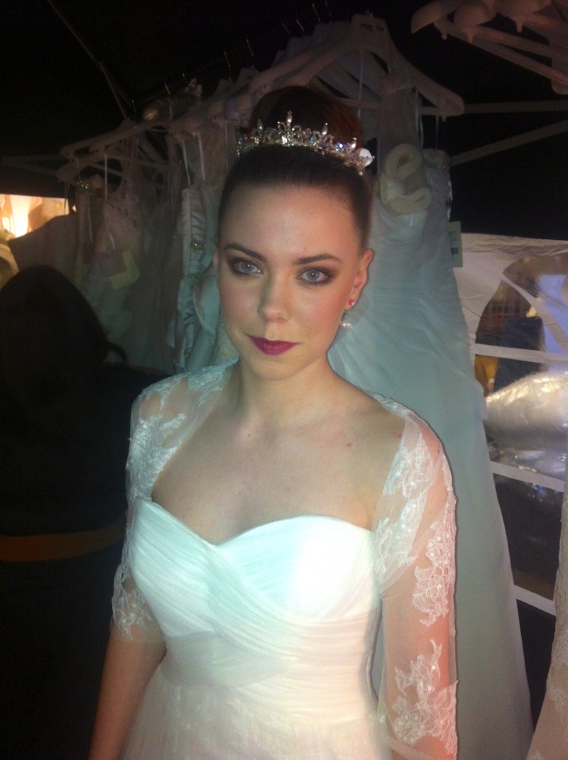 Female model photo shoot of Sara Bryant Makeup in Behind the scenes at Pronovias Fashion Show