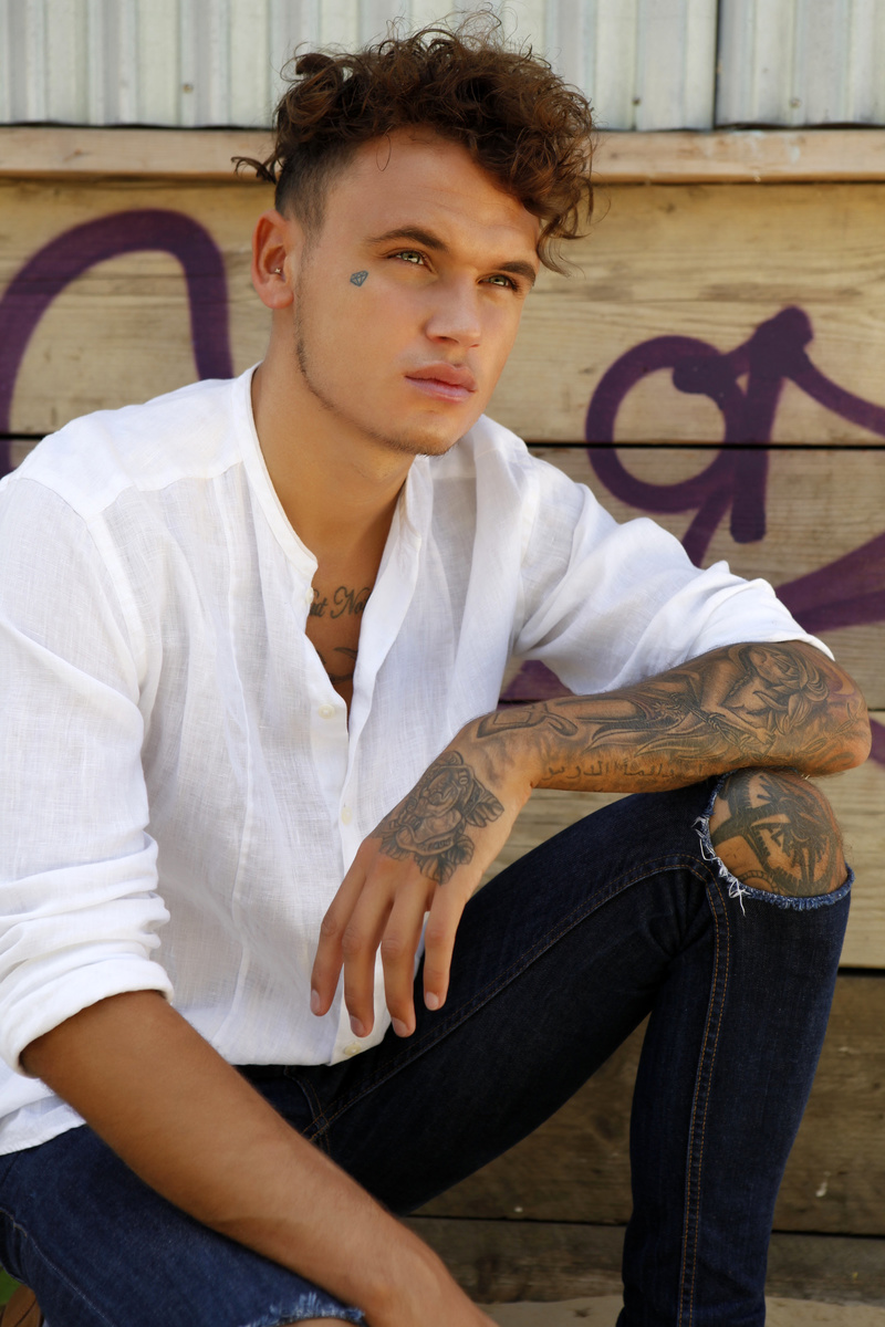 Male model photo shoot of Kev Mafia