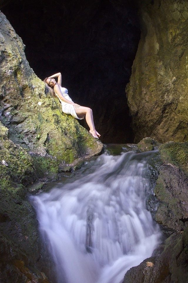 Female model photo shoot of Mara Marija Trifunovic in Water Cave in western Serbia