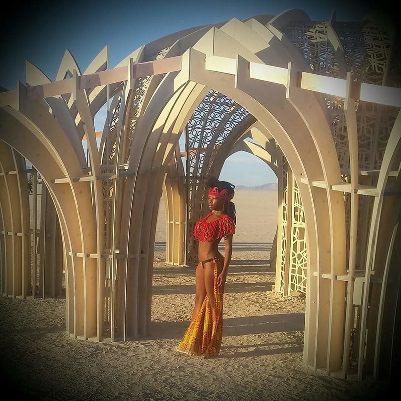 Female model photo shoot of GoWithTheFlo in Burning Man