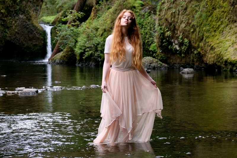 Female model photo shoot of ElizabethChampion by Wanderlust Imagery in Punchbowl Falls, Oregon