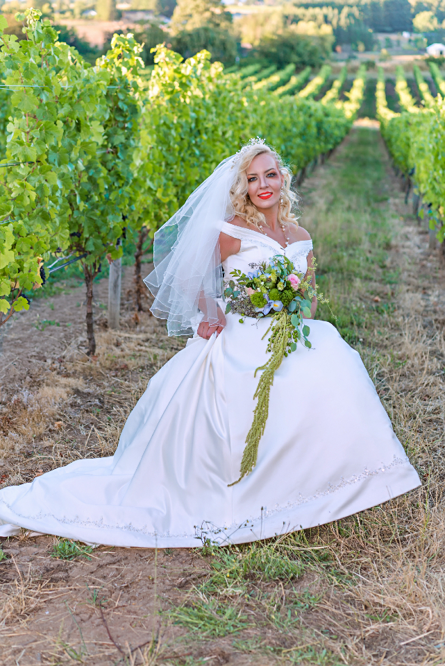 Female model photo shoot of rachealberks in plum hills winery