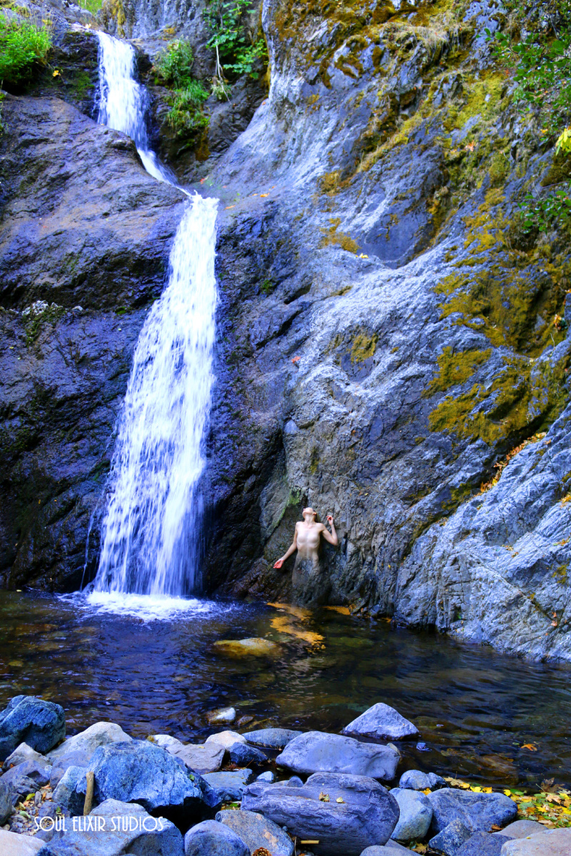 Female model photo shoot of SoulElixirStudios and Ember Noelle in Fairy Falls, Mount Shasta