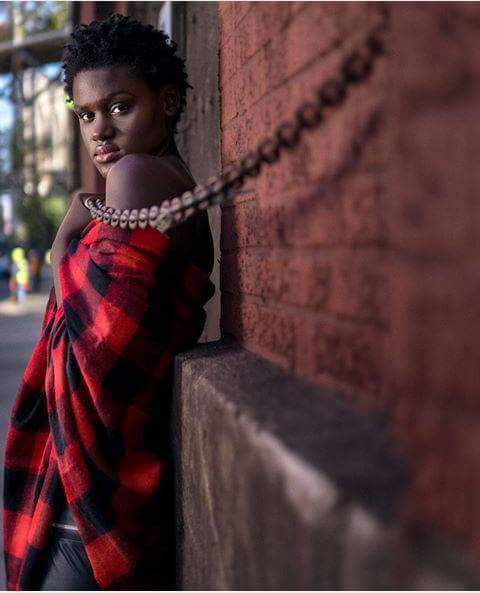 Female model photo shoot of Fatou Sidibe