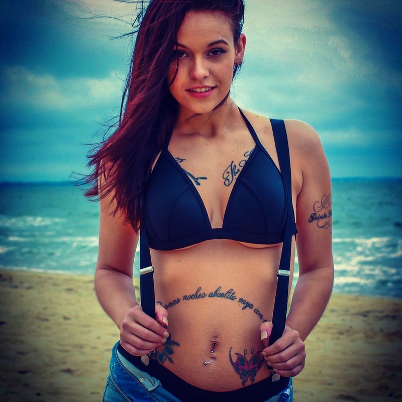Female model photo shoot of Kaylynncoy12 in Ocean front pier