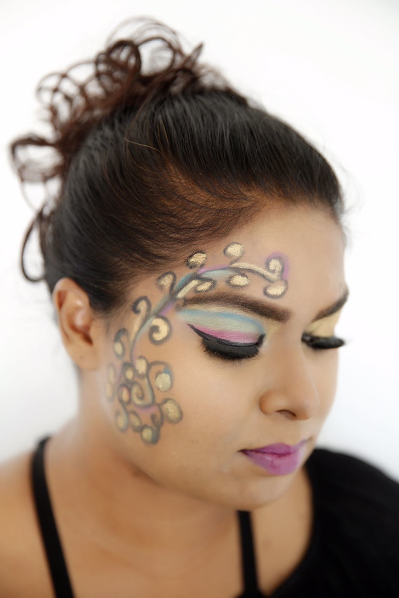 Female model photo shoot of NiveditaMUA in Los Angeles  makeup school