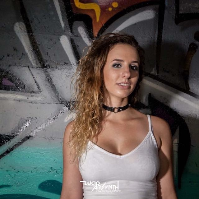 Female model photo shoot of curlsncutegirls in Downtown Sacramento