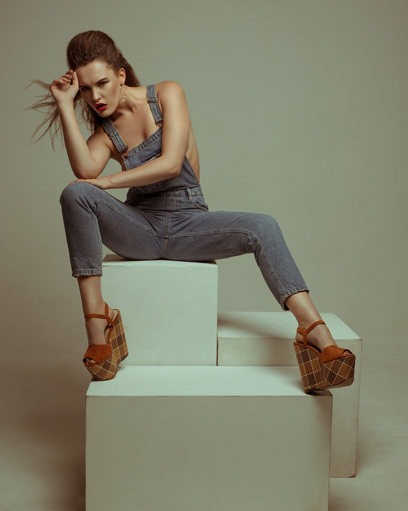 Female model photo shoot of LaylaLeighRetouch in Eyebox Studio